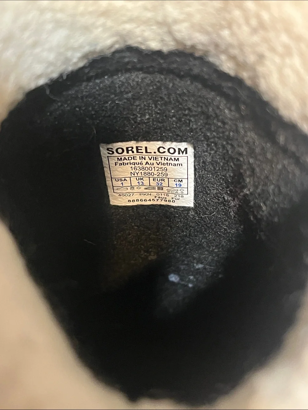 Sorel kids Tan and Black Waterproof Snow Boot with White Fleece Cuff- size 1